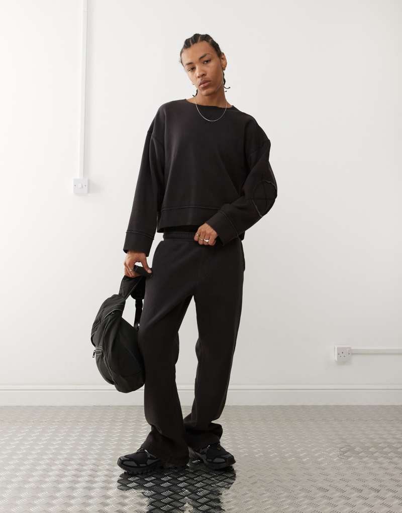 Weekday relaxed sweatpants in black acid wash - part of a set Weekday