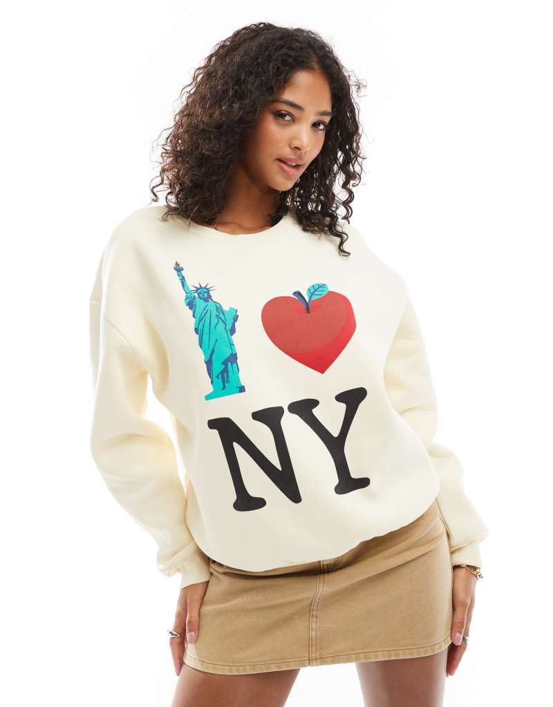 ASOS DESIGN brushback sweatshirt with New York Graphic in ecru ASOS DESIGN