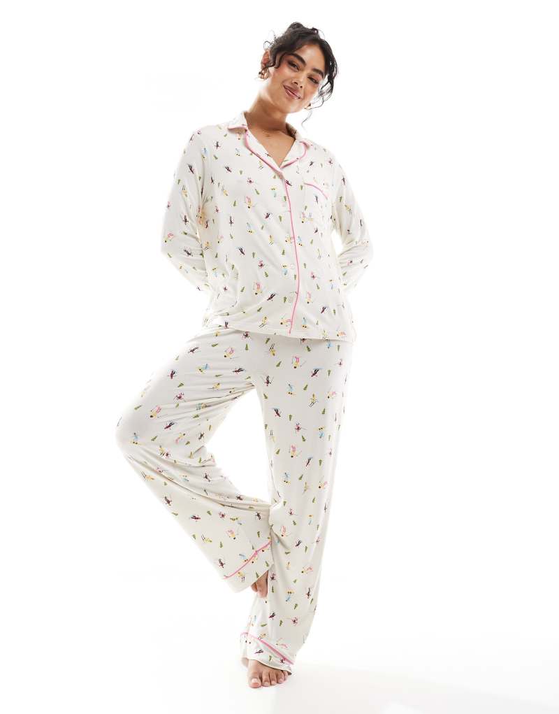 ASOS DESIGN super soft long sleeve shirt & pants pajama set with contrast piping in ski print ASOS DESIGN