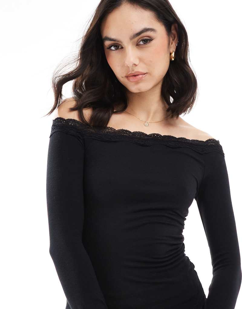 Bershka asymmetric lace detail top in black Bershka