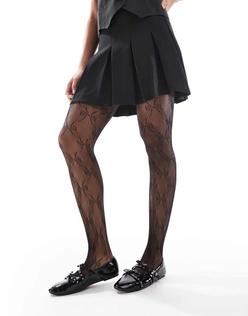 Pieces fishnet bow tights in black Pieces