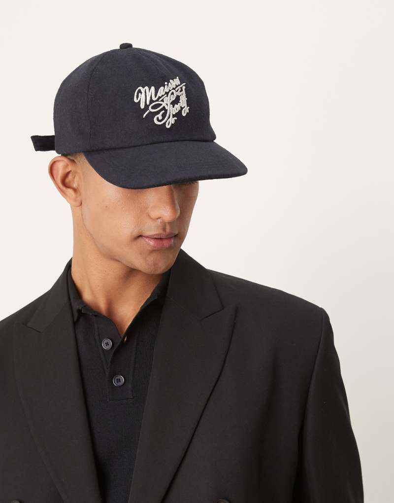 ASOS DESIGN vintage casual baseball cap in navy melton with chainstitch embroidery detail ASOS DESIGN