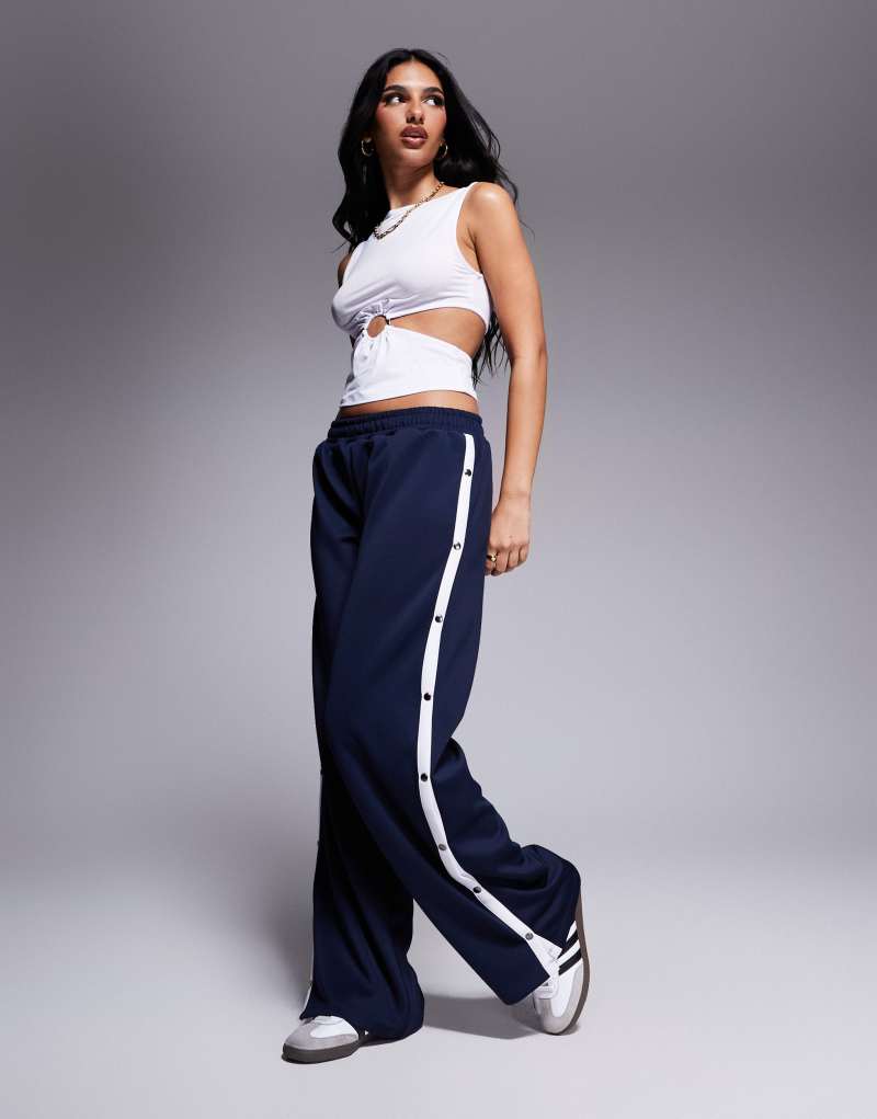 ASOS DESIGN wide leg pants with stripe and snaps in navy Asos Design