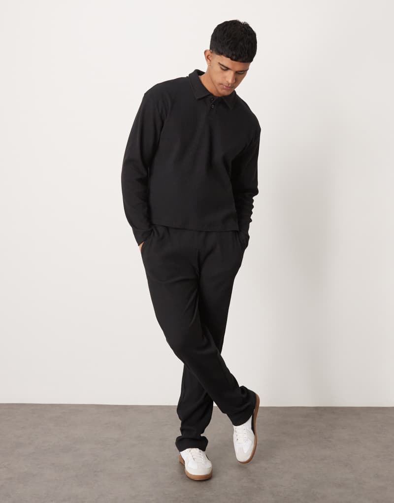 ASOS DESIGN ribbed straight leg sweatpants in washed black Asos Design