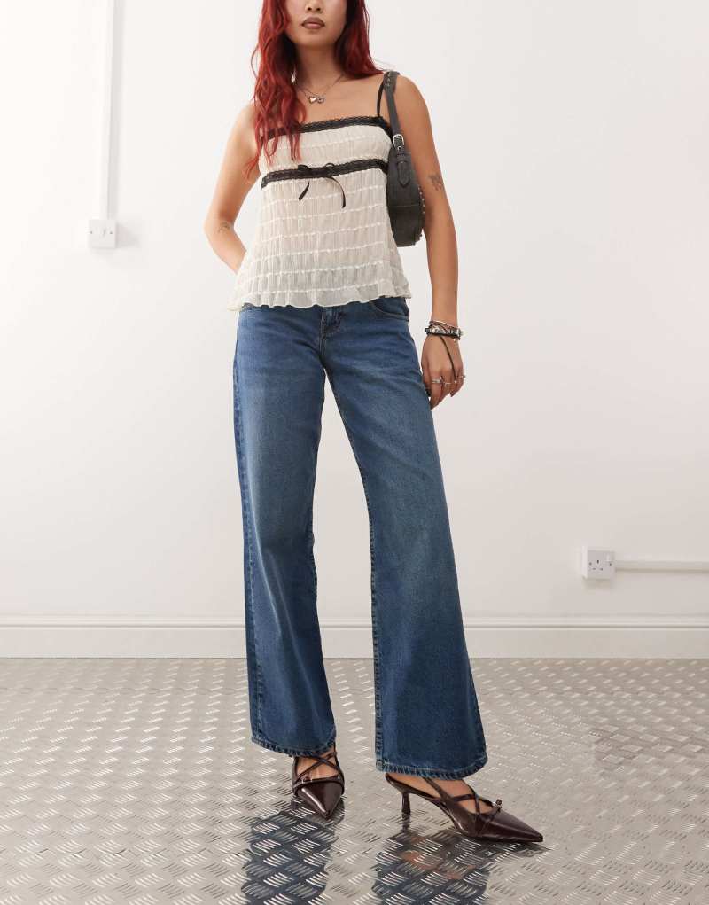 Motel low rise parallel jeans in mid blue used Motel