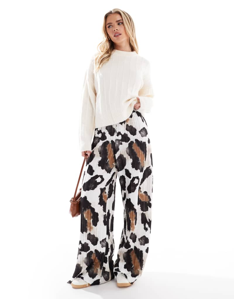 Vero Moda Petite plisse wide leg pants in abstract animal print Vero Moda