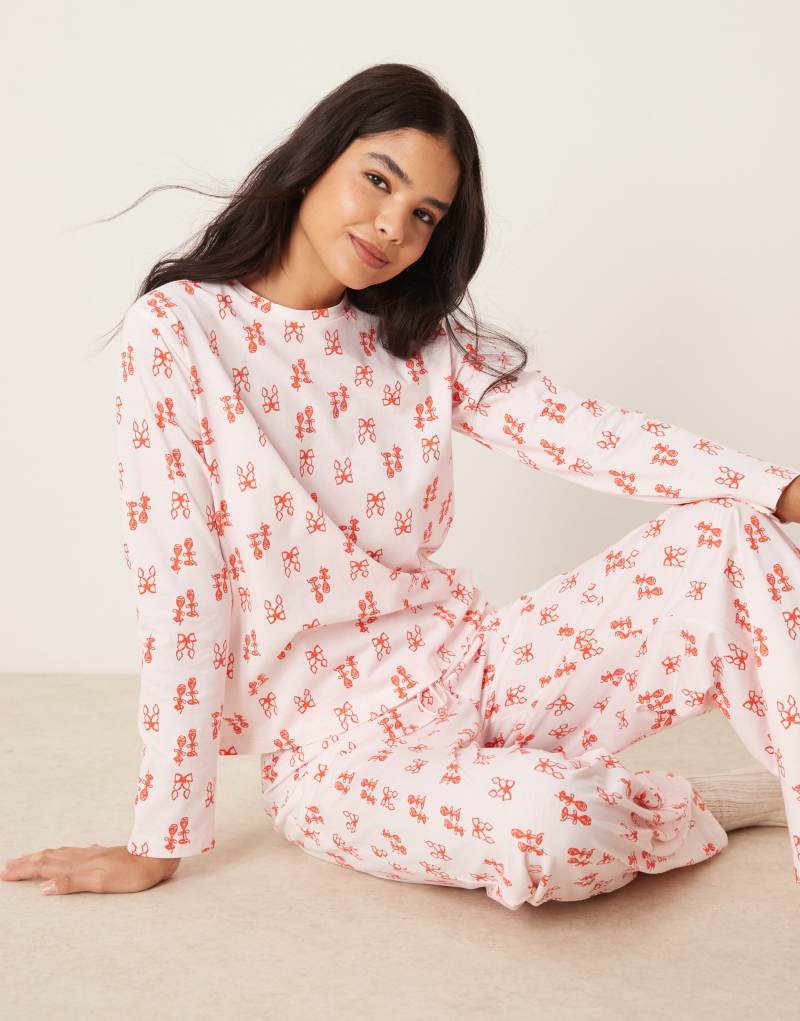 ASOS DESIGN long sleeve top & pants pajama set in pink and red bow print Asos Design