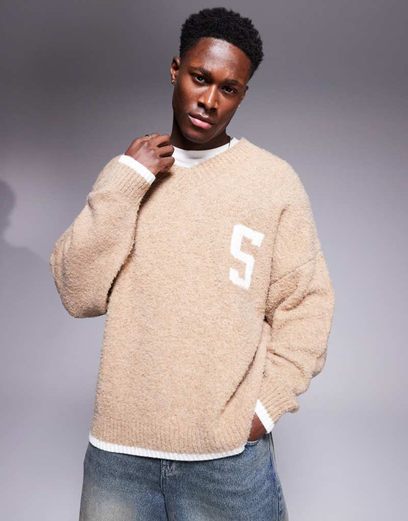 ASOS DESIGN oversized boxy fit boucle knit V-neck sweater with chest pattern and tipping in beige Asos Design