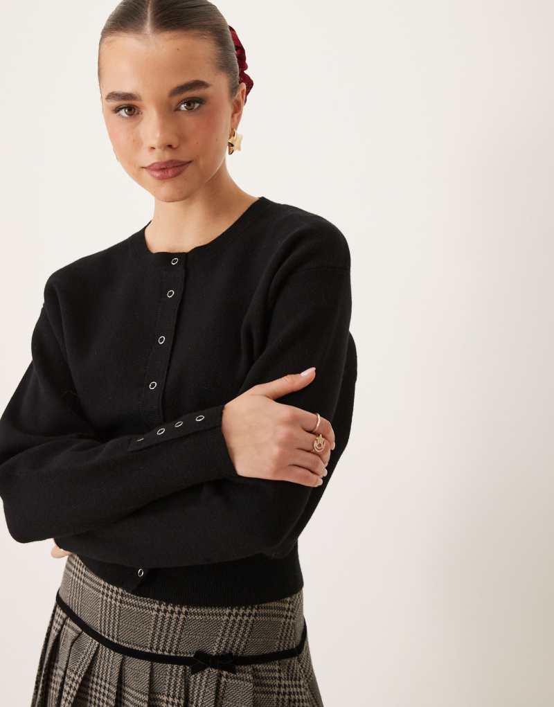 Gina Tricot knitted cardigan with deep rib fitted waist and button cuff detail in black Gina Tricot