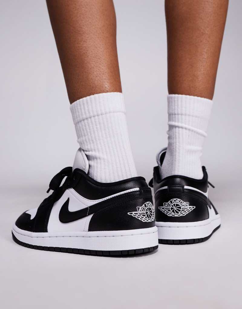 Кроссовки Nike Air Jordan 1 Low в белом и черном цвете с амортизацией Air и вентиляцией Jordan