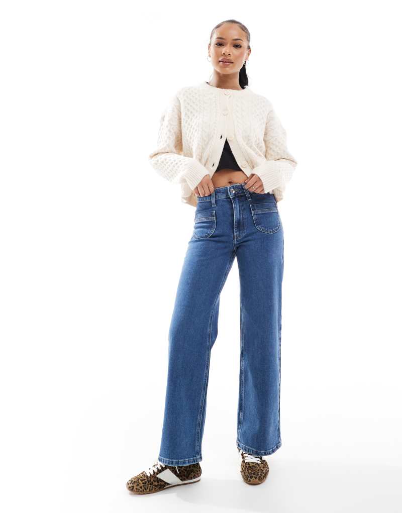 ONLY Petite Juicy high waist wide leg jeans with pocket detail in mid wash blue Only