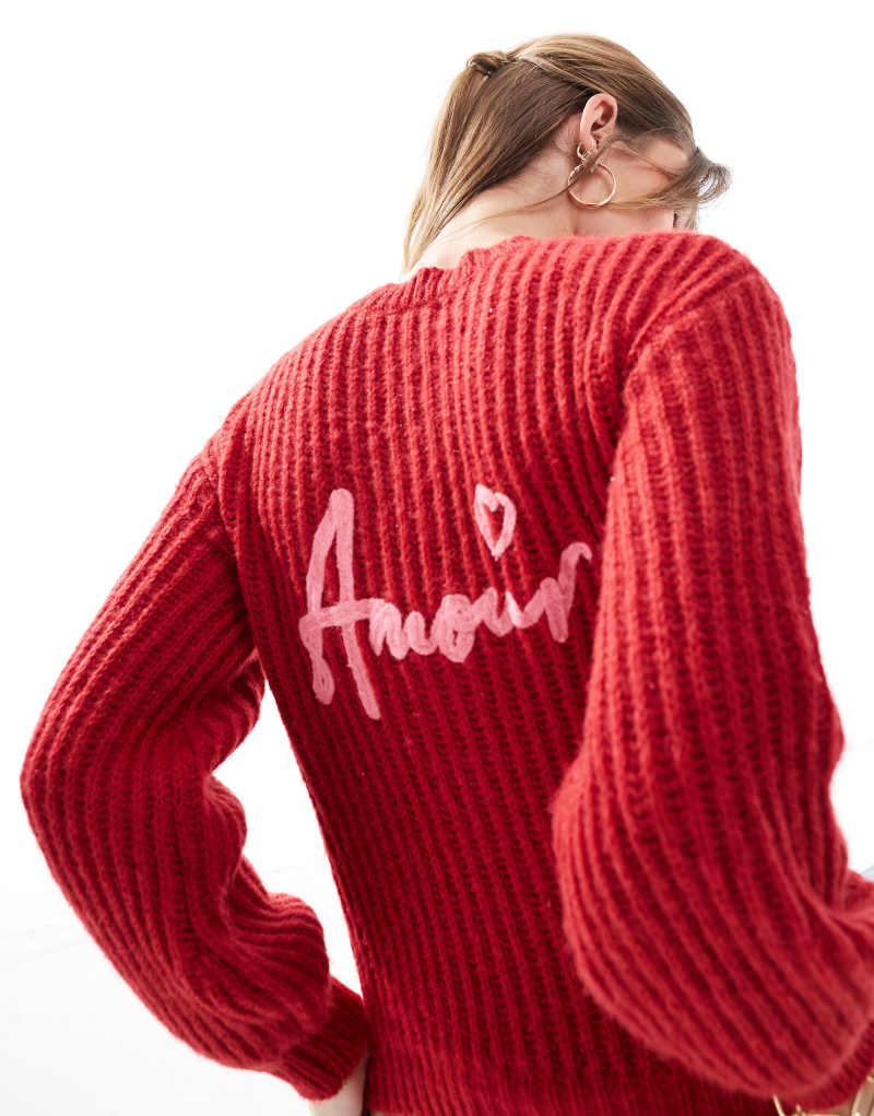 The Frolic exclusive volume sleeve Amour embroidered back detail heart button cardigan in red The Frolic