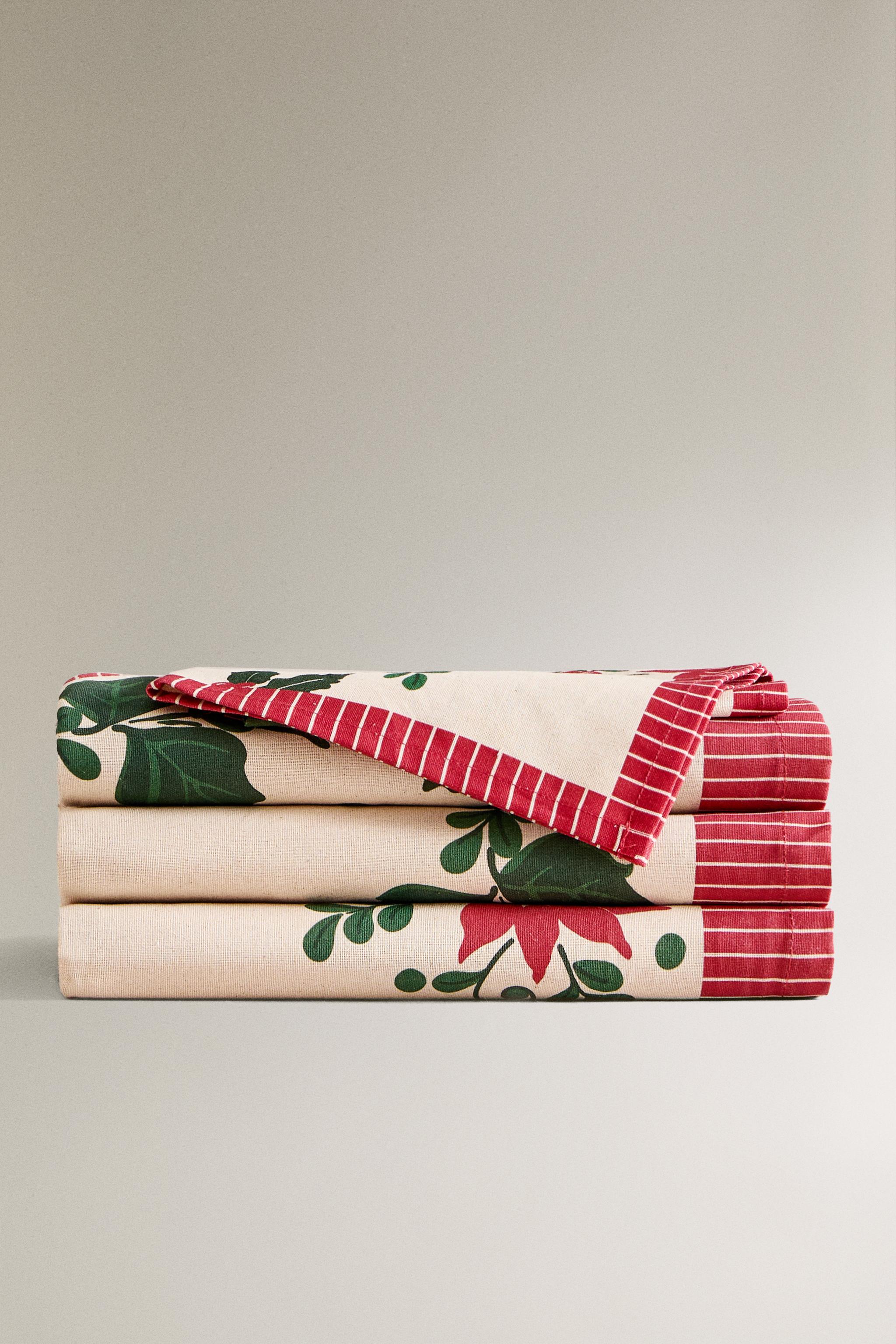 CHRISTMAS TABLECLOTH WITH POINSETTIA BORDER Zara Home