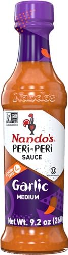 Nandos PERi PERi Garlic Sauce - Spicy Sauces, Seasoning or Marinade for Wings, Meat, Fish or Veg - Non-GMO, No MSG, Gluten Free - 9.2 Oz Garlic Nando's