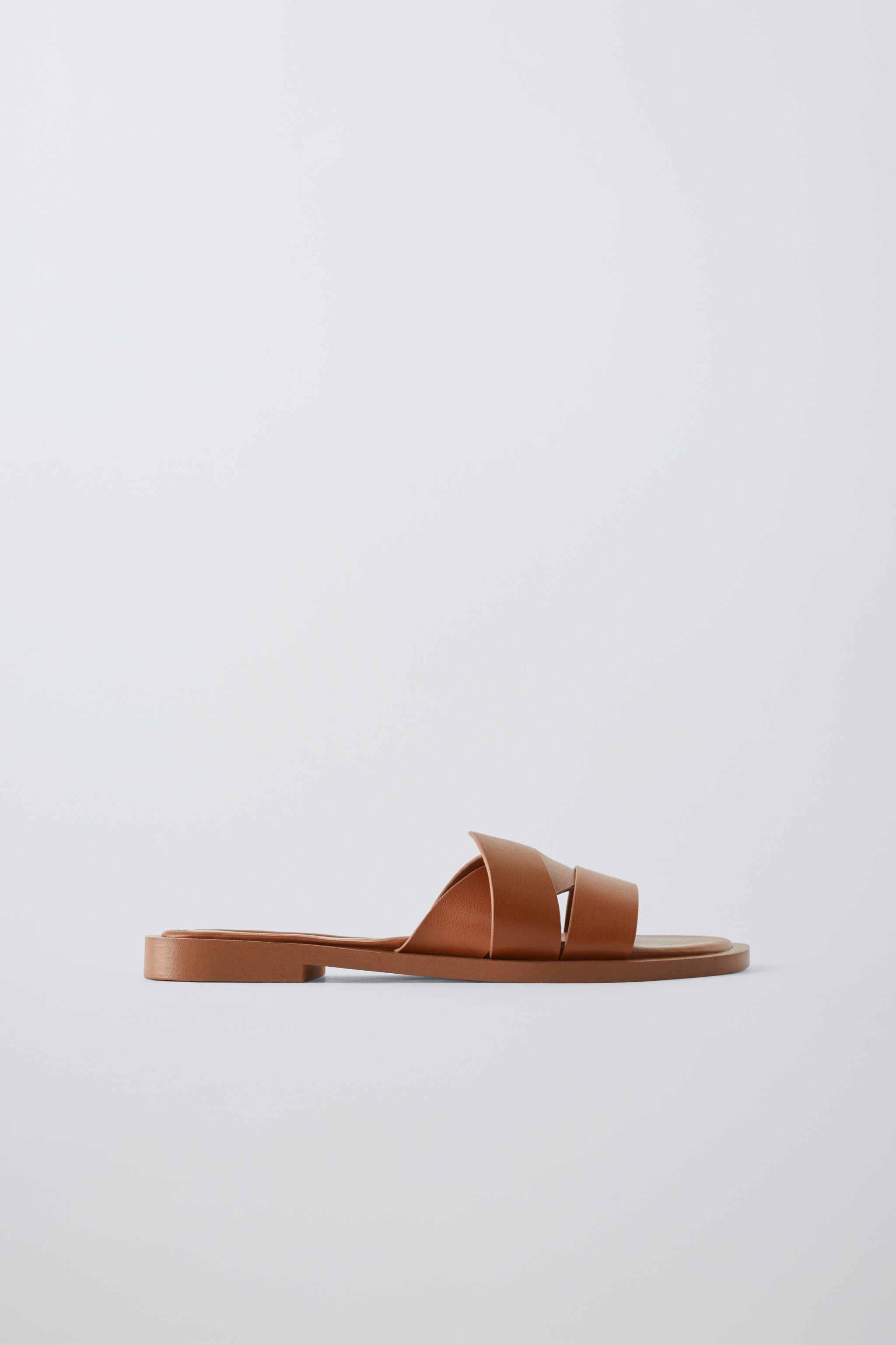 FLAT CROSSED-STRAP SANDALS Zara