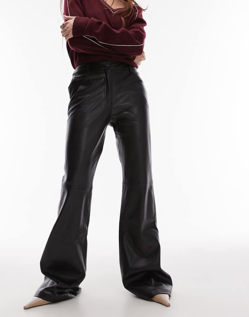 Mango flare leg leather look pants in dark red Mango