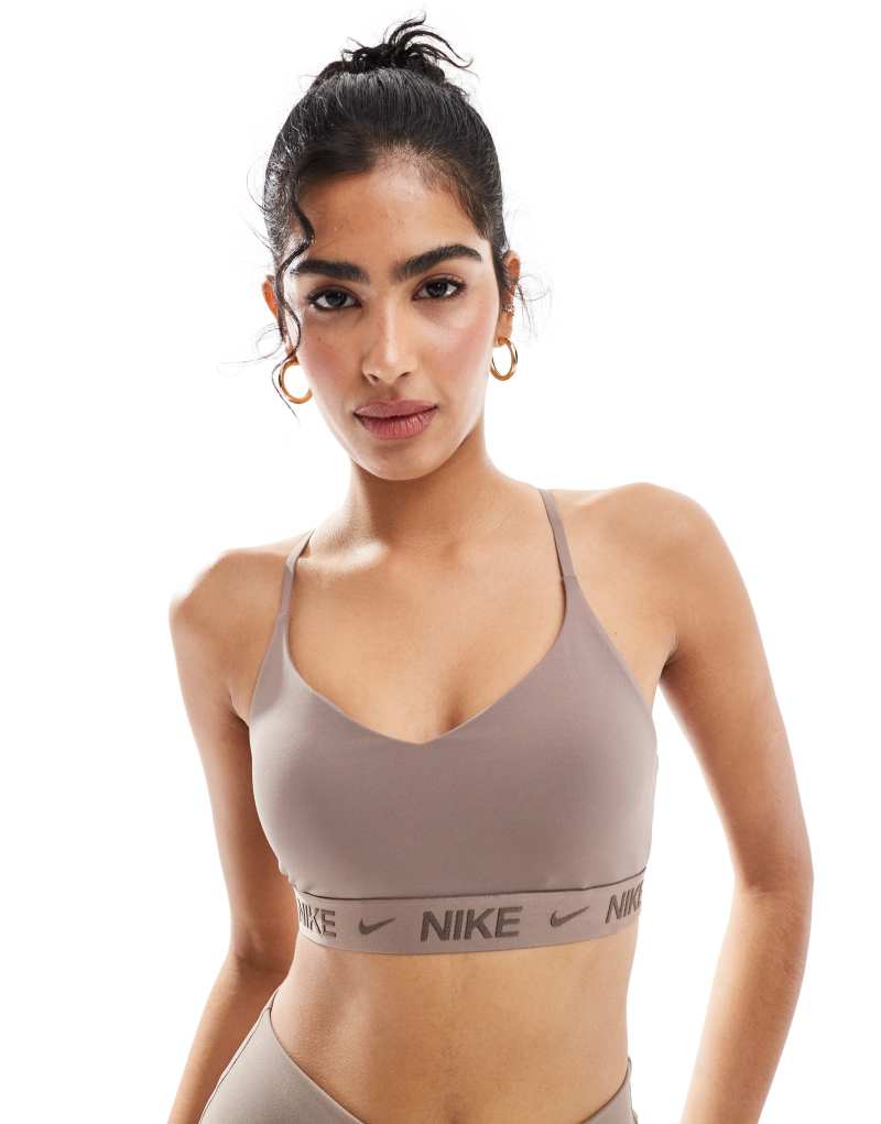 Nike Training Indy light support sports bra in brown Nike