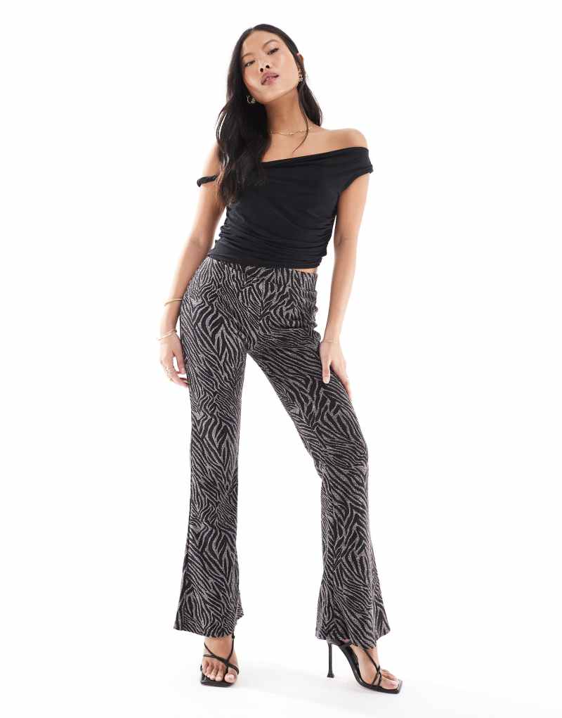 ONLY Petite flared glitter pants in black Only