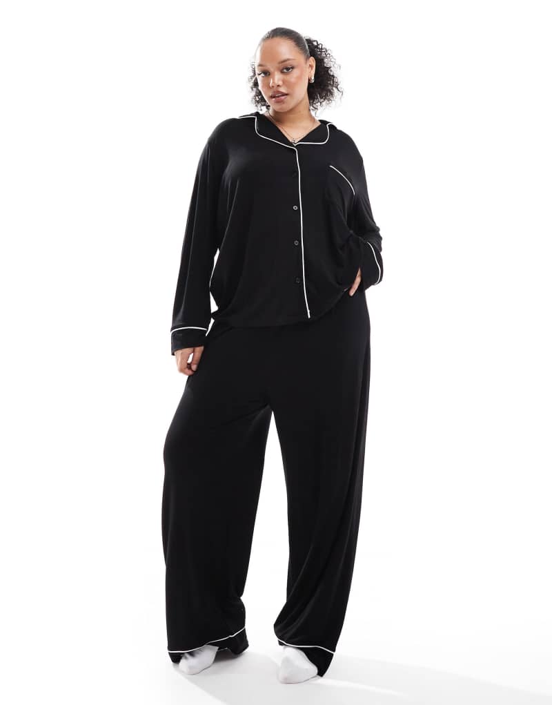 ASOS DESIGN Curve super soft long sleeve shirt & pants pajama set with contrast piping in black ASOS Curve