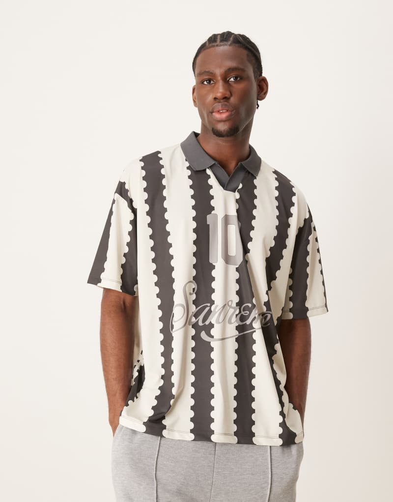 ASOS DESIGN oversized polo with sports graphic and all over print Asos Design