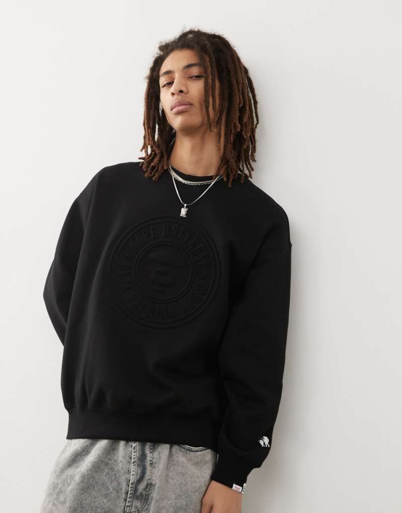 Aape By A Bathing Ape embossed logo sweatshirt in black Aape By A Bathing Ape®