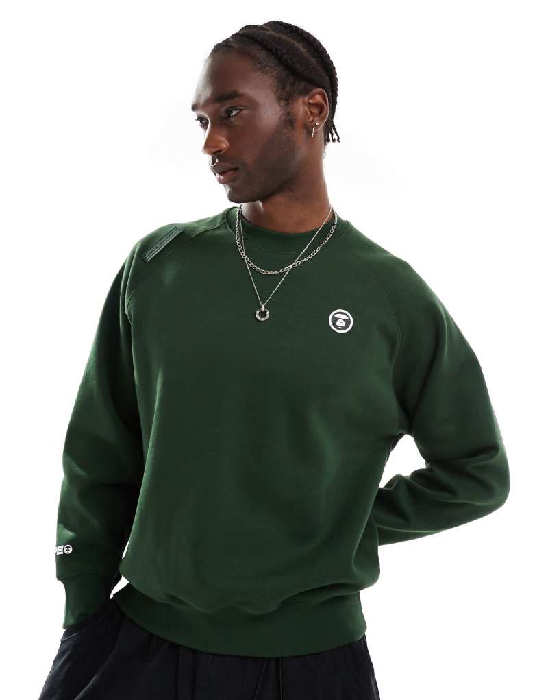 Aape By A Bathing Ape Now crew neck sweatshirt in dark green  Aape By A Bathing Ape®