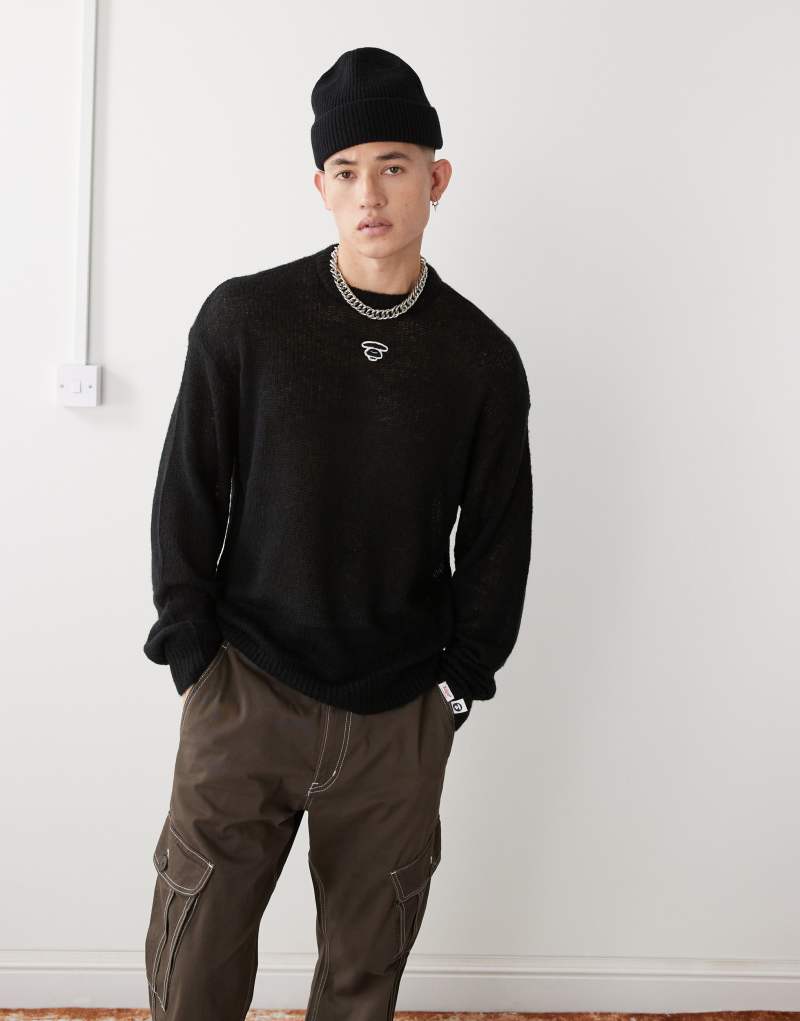 AAPE By A Bathing Ape printed back logo sweater in black Aape By A Bathing Ape®