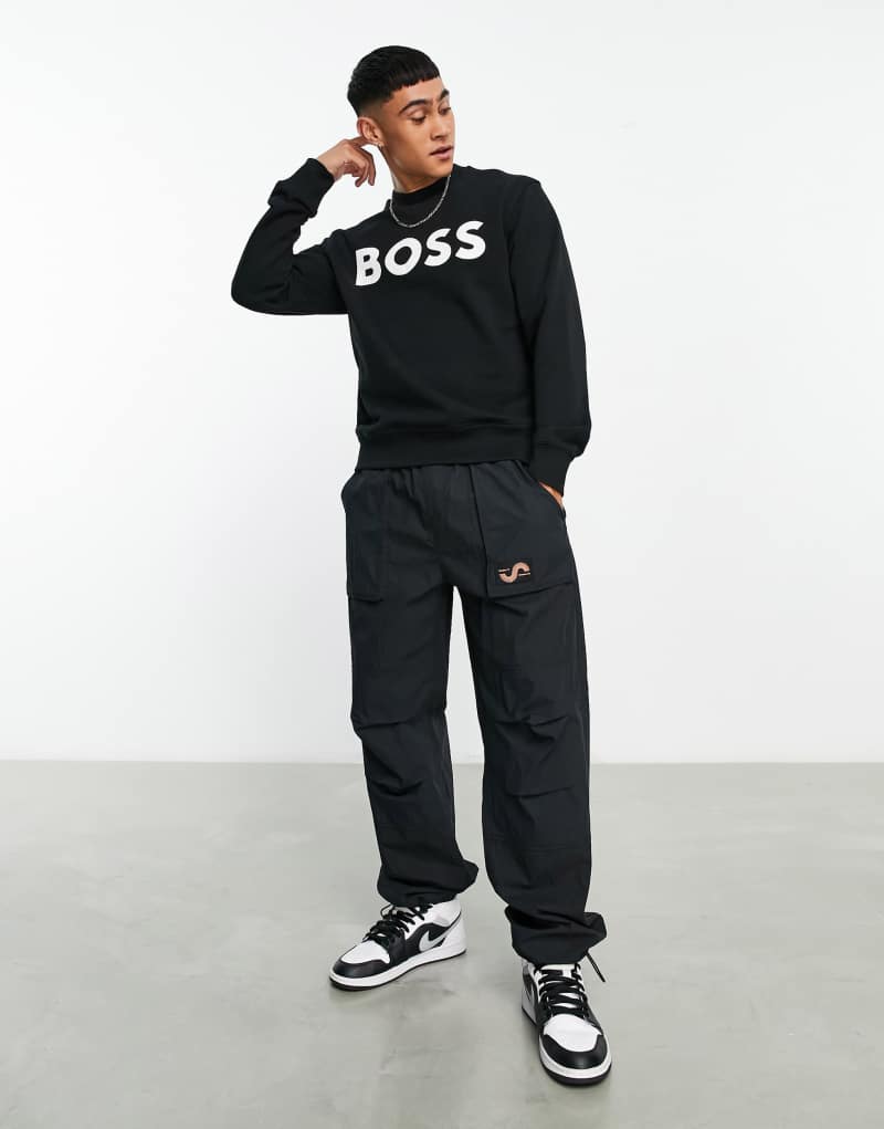 BOSS Orange WeBasicCrew large logo relaxed fit sweatshirt in black BOSS Orange