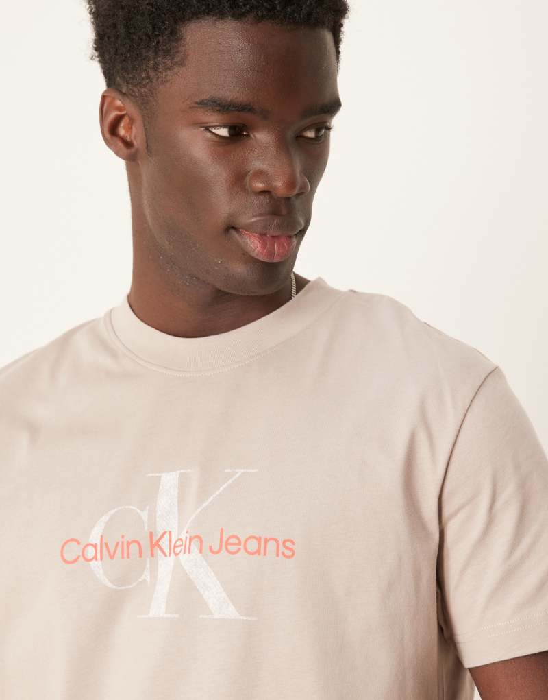 Calvin Klein Jeans large logo t-shirt in beige and red Calvin Klein