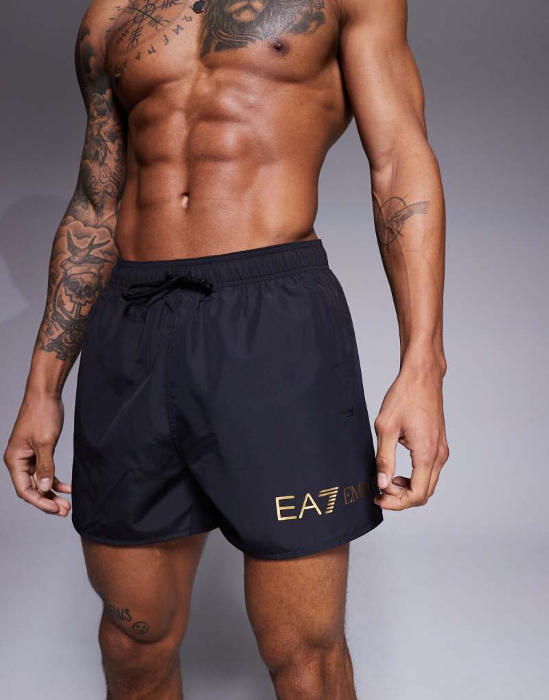 Armani EA7 gold logo swim shorts in black EA7 Emporio Armani