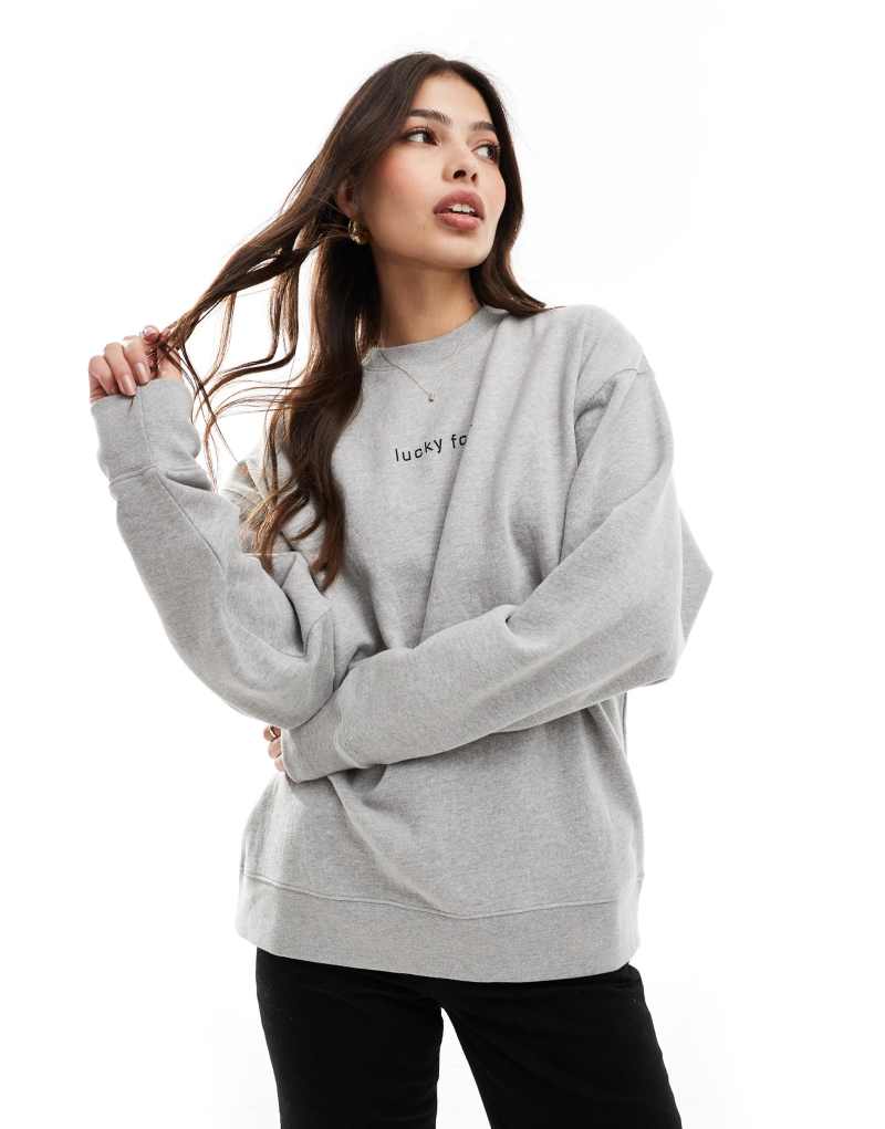 French Connection FCUK sweatshirt with lucky slogan in gray French Connection