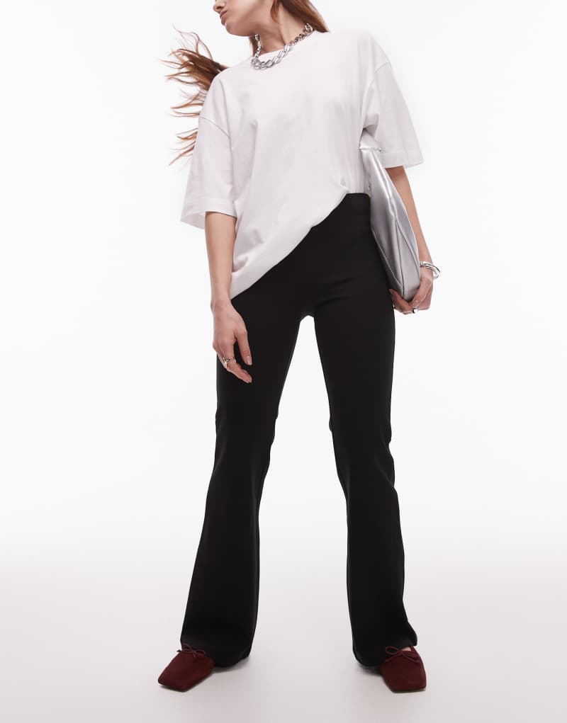 Mango fitted high waist flare pants in black Mango