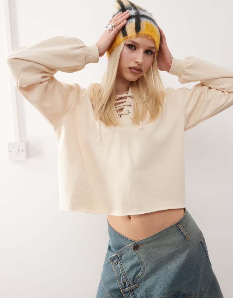 Monki cropped hoodie with lacing detail in off white Monki