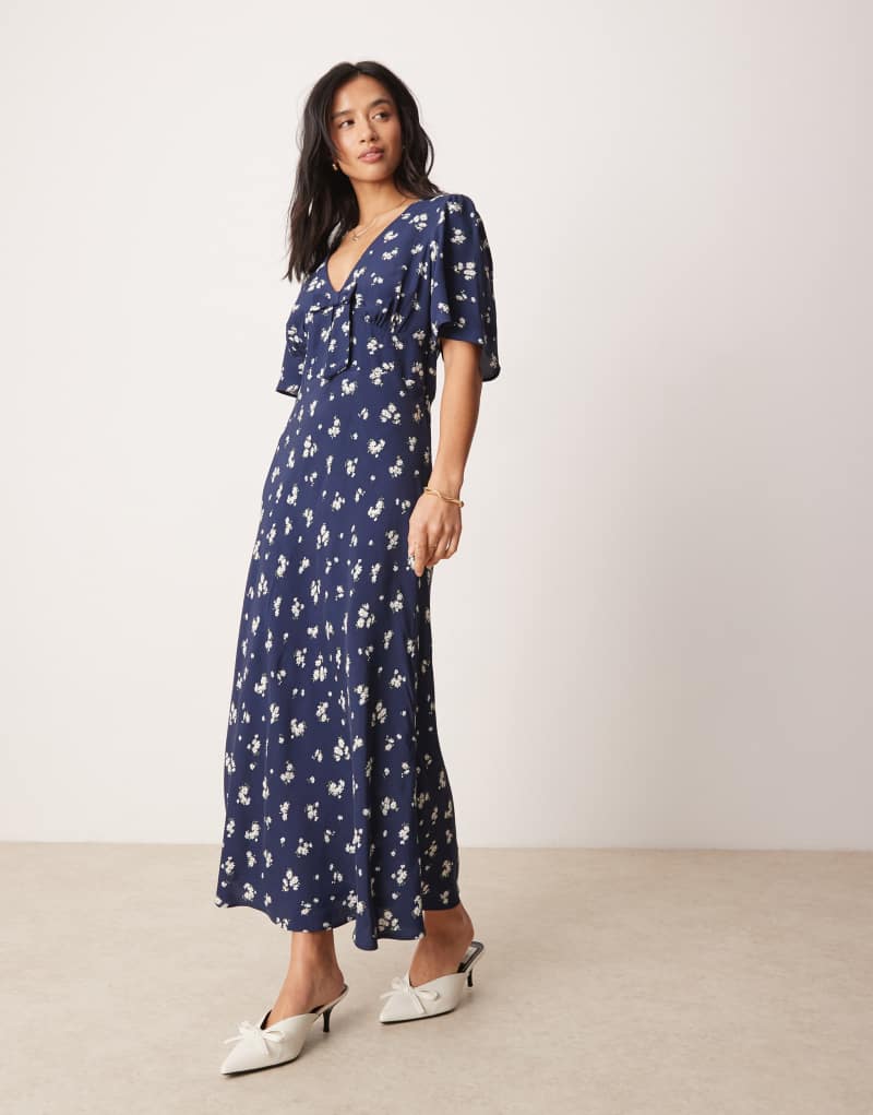 Nobody's Child Petite Faith midi tea dress with bow in navy daisy print Nobody's Child