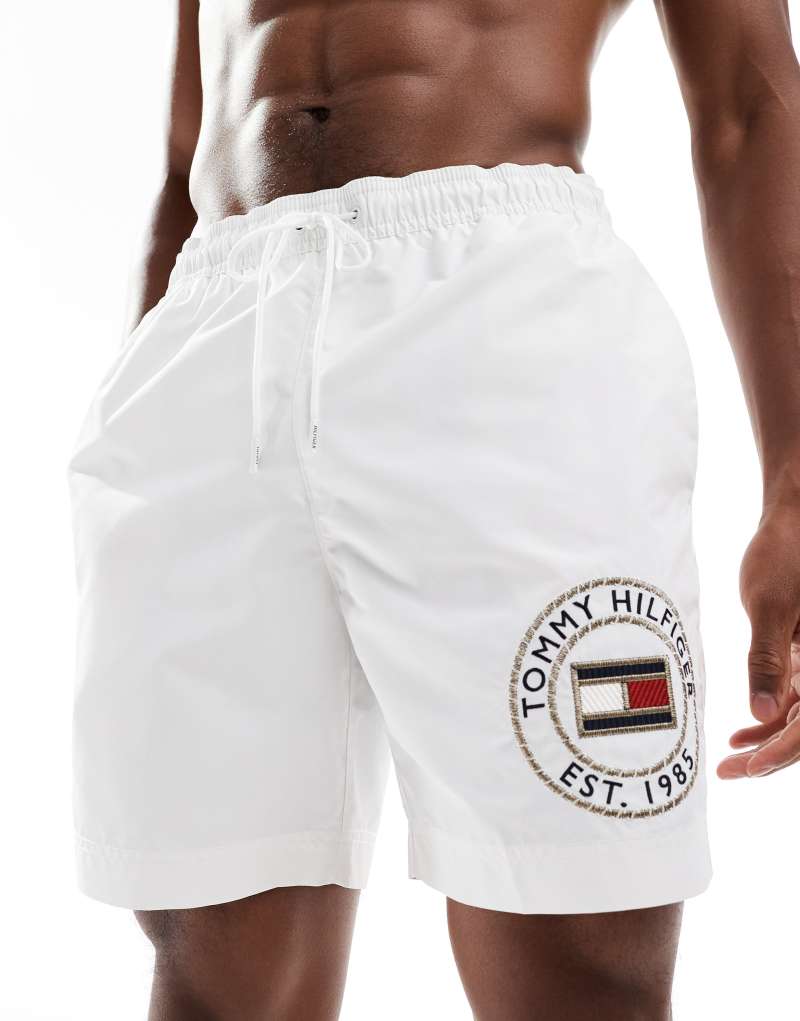 Tommy Hilfiger logo long drawstring swim short in white Tommy Hilfiger