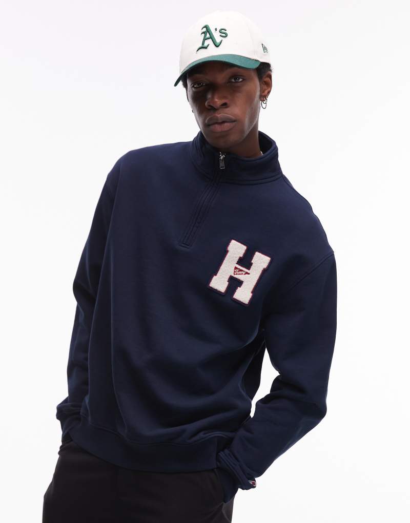 Tommy Jeans varsity patch 1/4 zip sweatshirt in navy Tommy Jeans