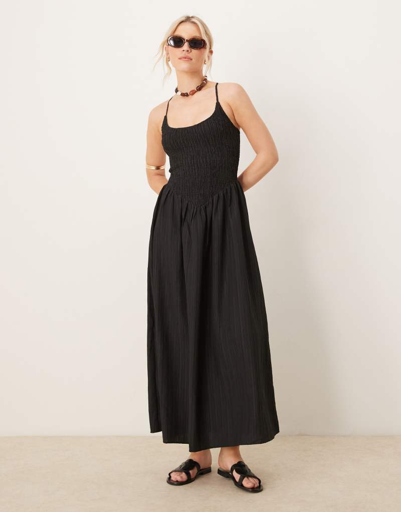 ASOS DESIGN scoop neck crinkle maxi dress with cross back in black Asos Design