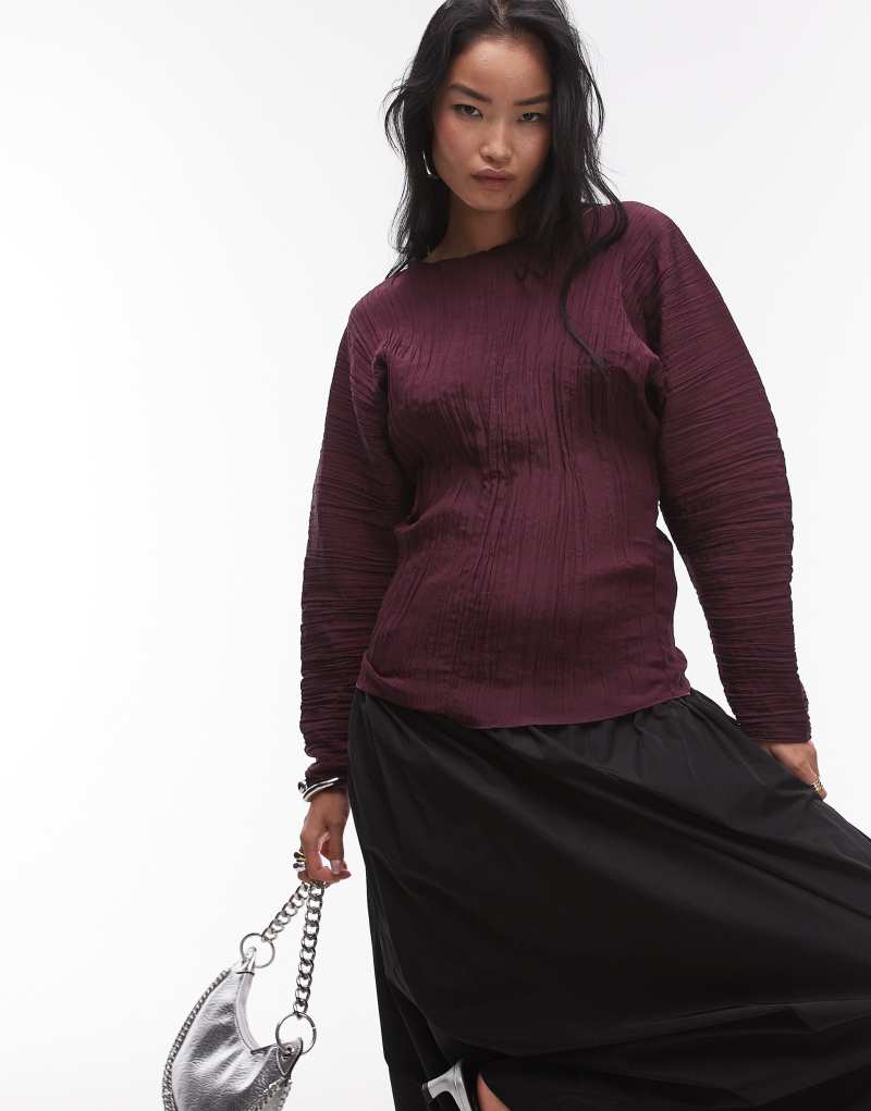 ARKET plisse top with sculptural sleeves in burgundy Arket