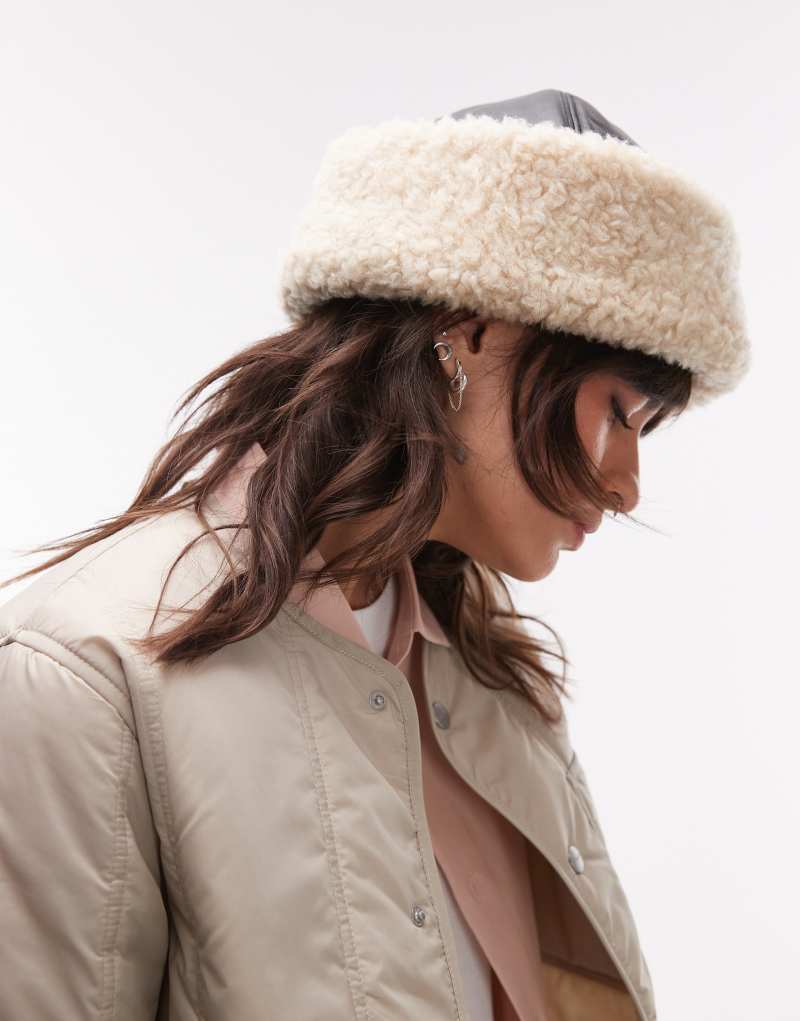 ARKET premium leather hat with faux shearling fold-over lining in black and cream Arket