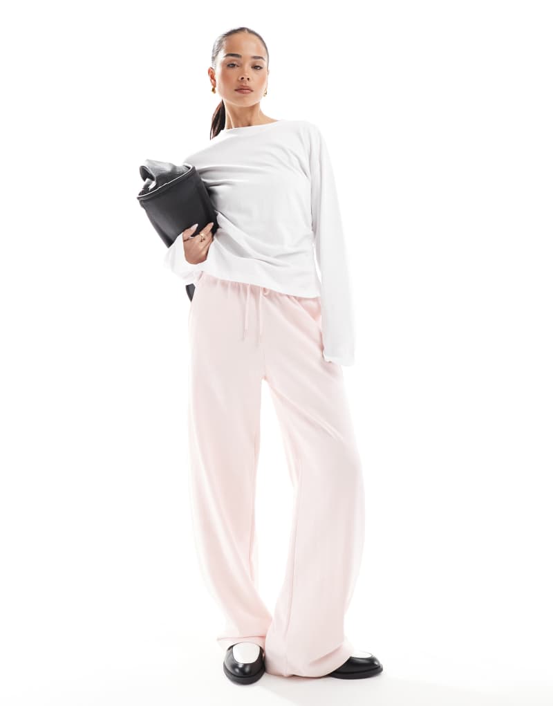 Bershka wide leg sweatpants in pale pink Bershka