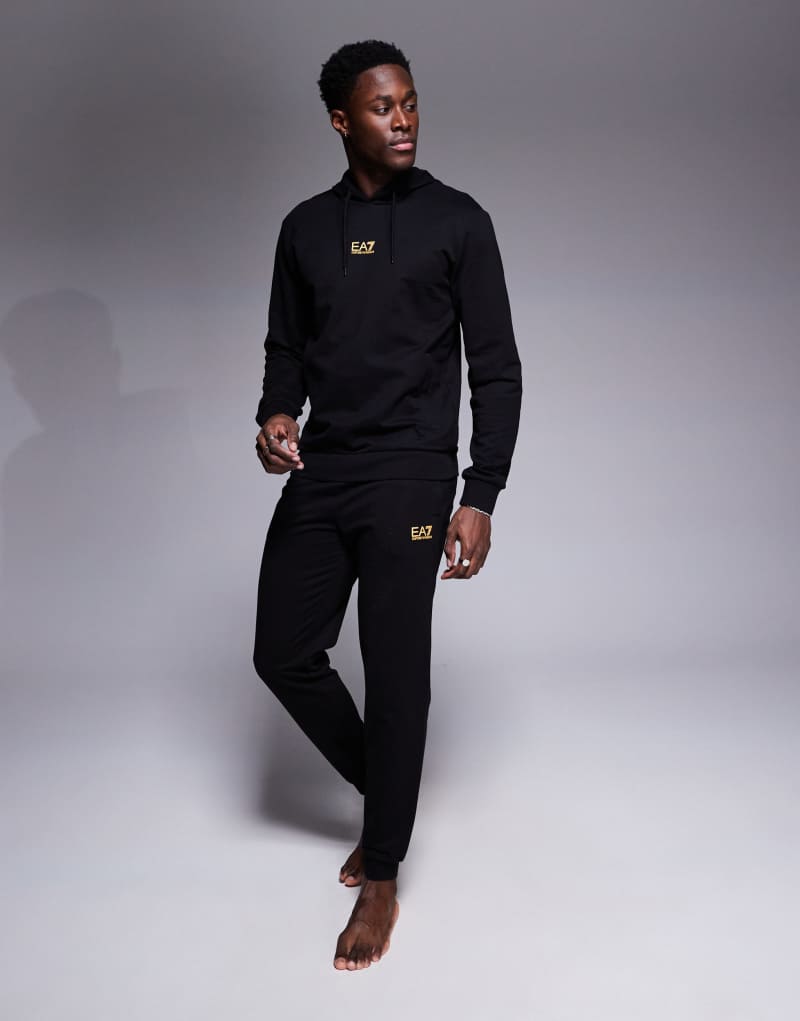 Armani EA7 central gold logo hoodie tracksuit in black EA7 Emporio Armani