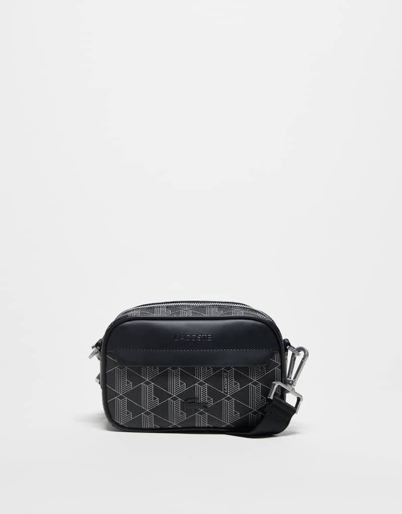 Lacoste reporter bag in black with all over monogram embossing Lacoste