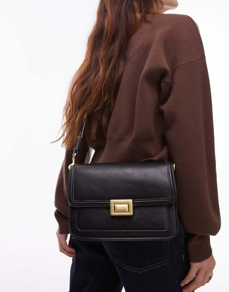 Mango cross body gold lock bag in black Mango