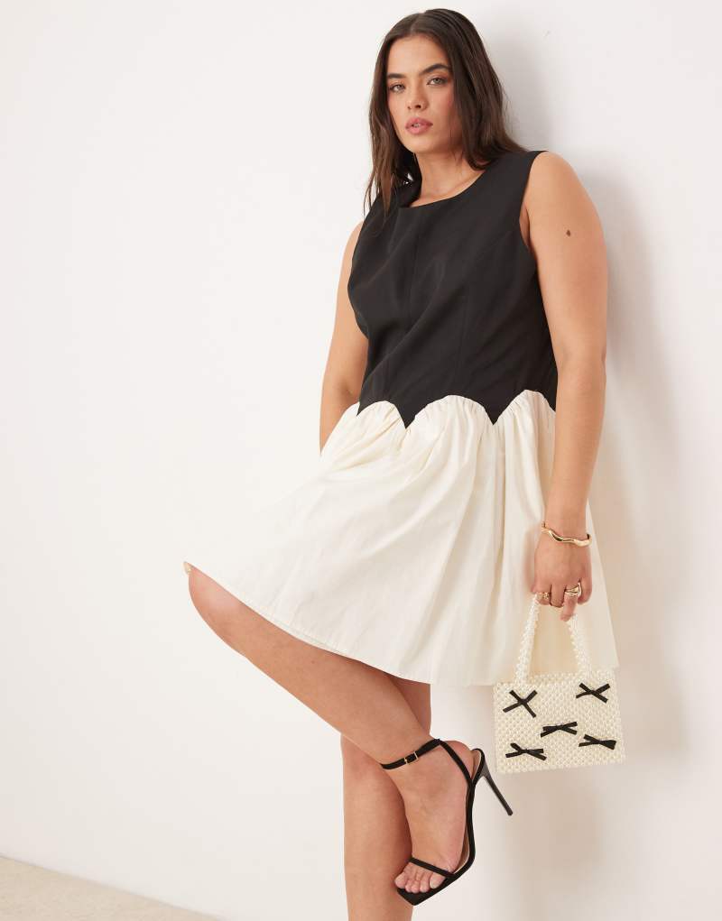 Never Fully Dressed Plus contrast drop hem mini dress in monochrome Never Fully Dressed