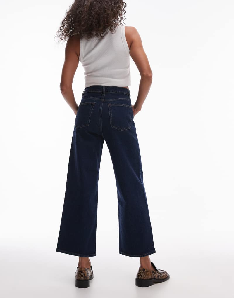 & Other Stories high rise flared jeans with patch pockets in dark blue wash & Other Stories