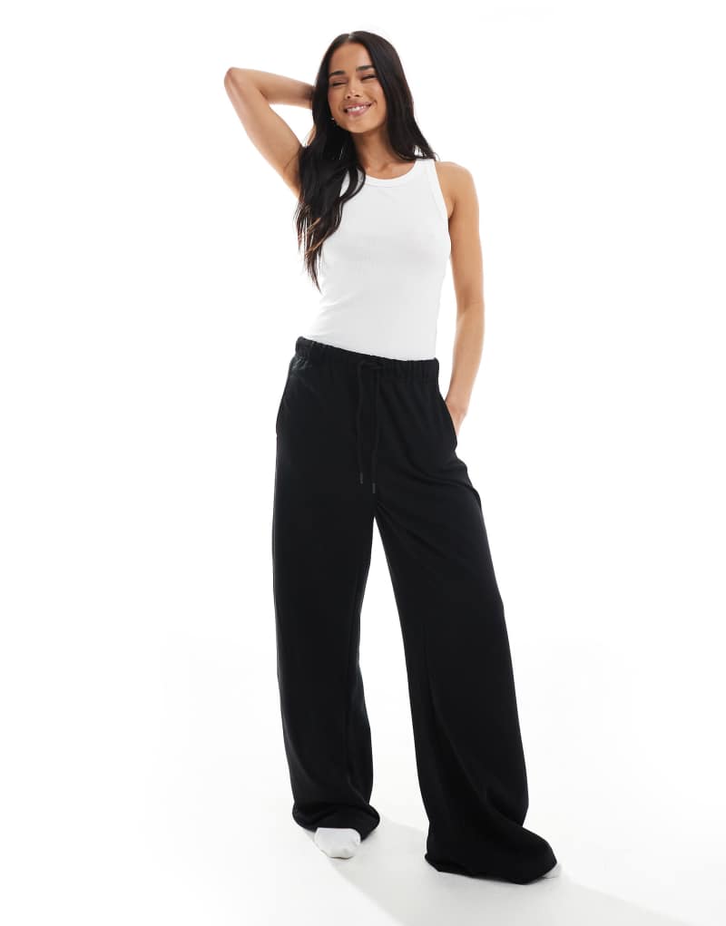 Bershka wide leg sweatpants in black Bershka