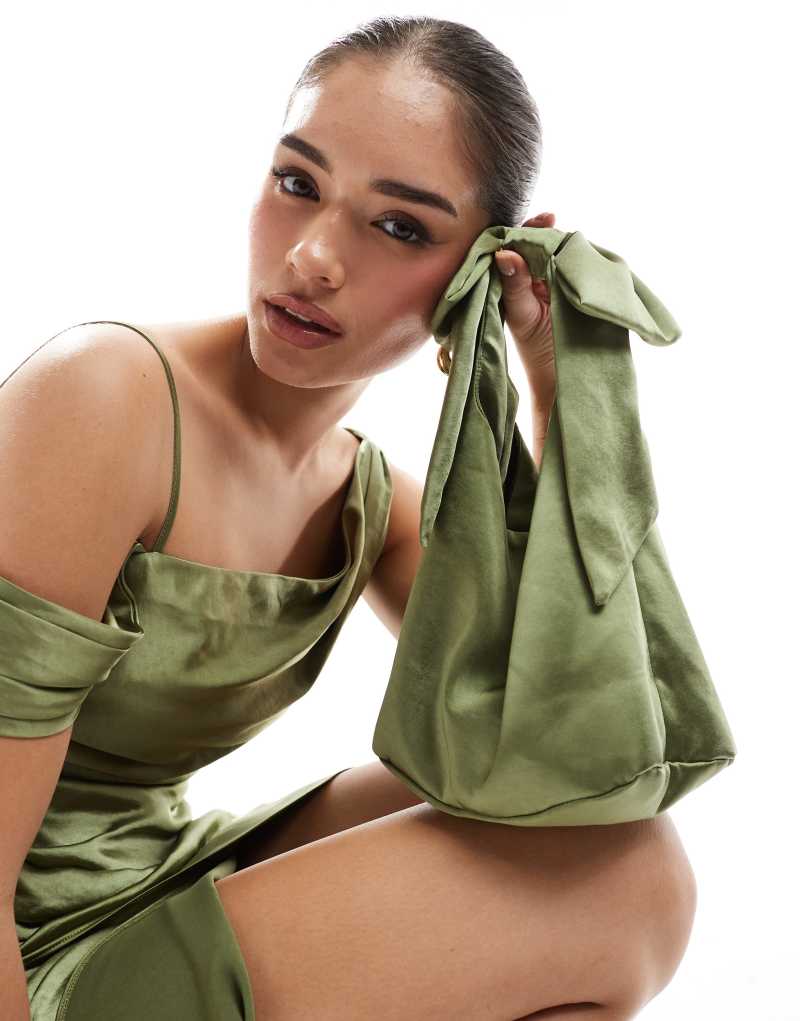 Six Stories Bridesmaid satin bow pouch bag in moss green Six Stories