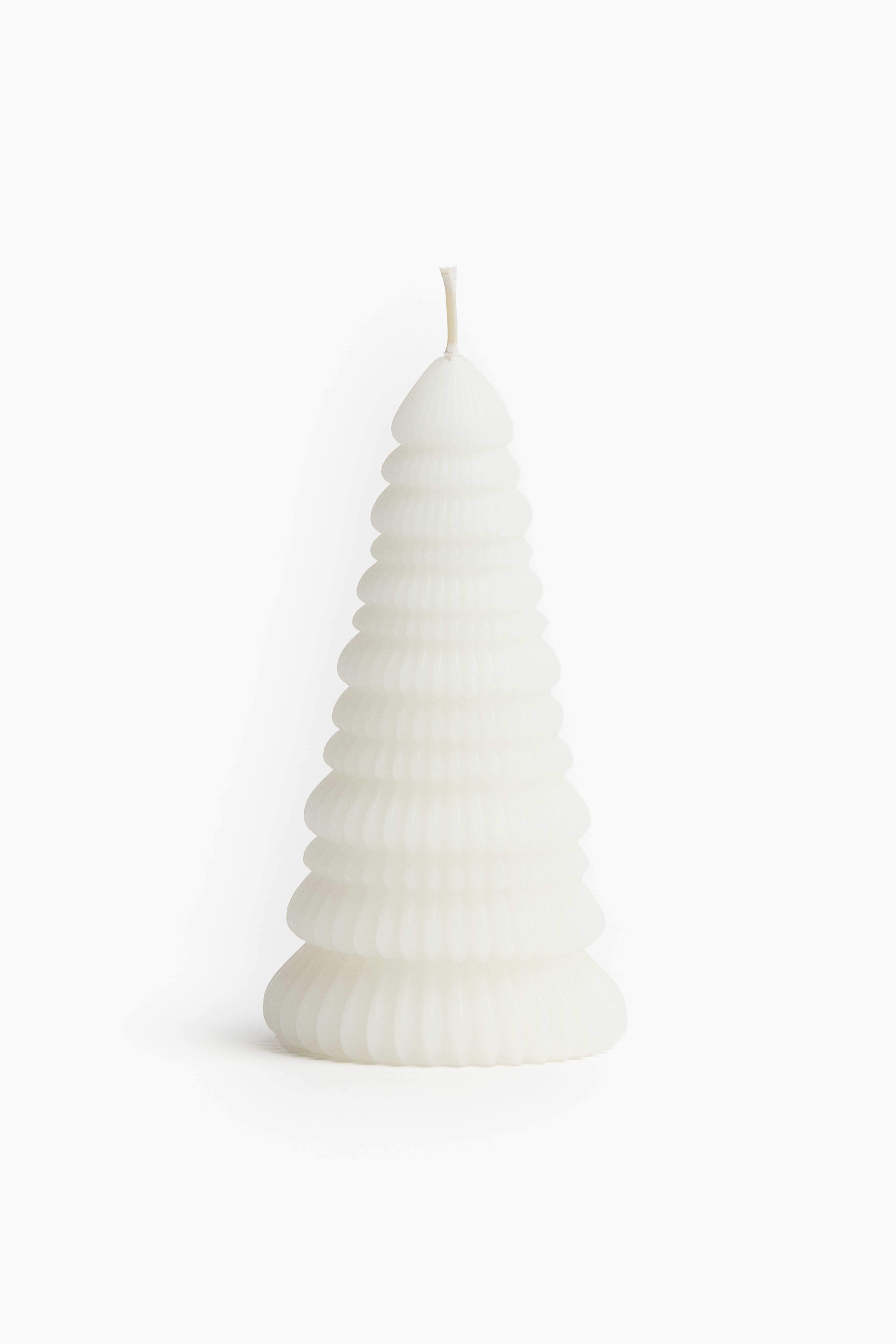 Small fir-tree-shaped candle H&M