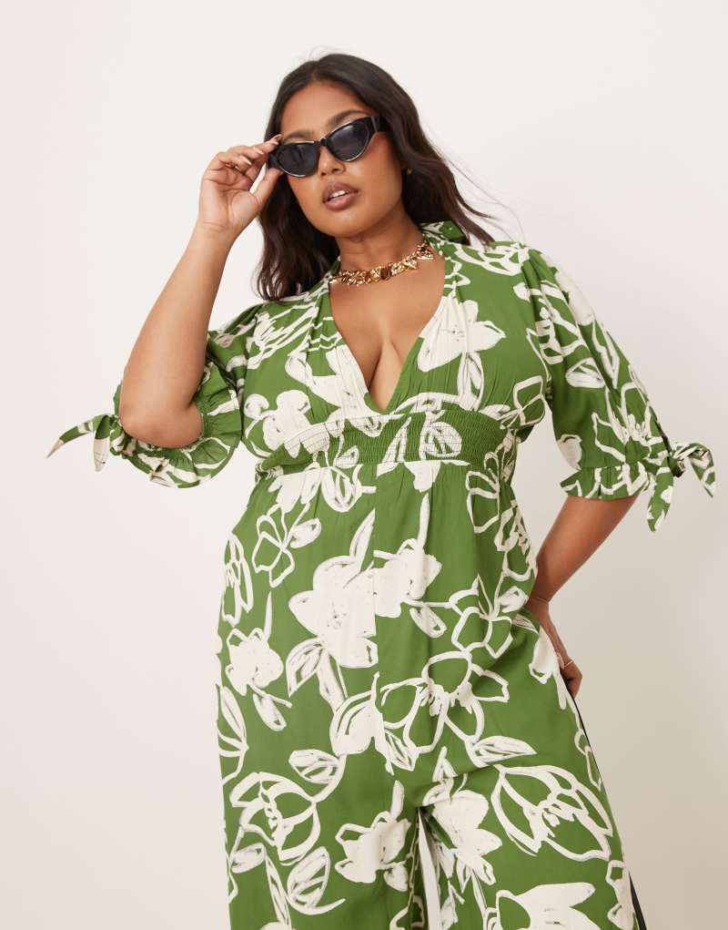 ASOS DESIGN Curve shirred waist jumpsuit in green floral print  ASOS Curve