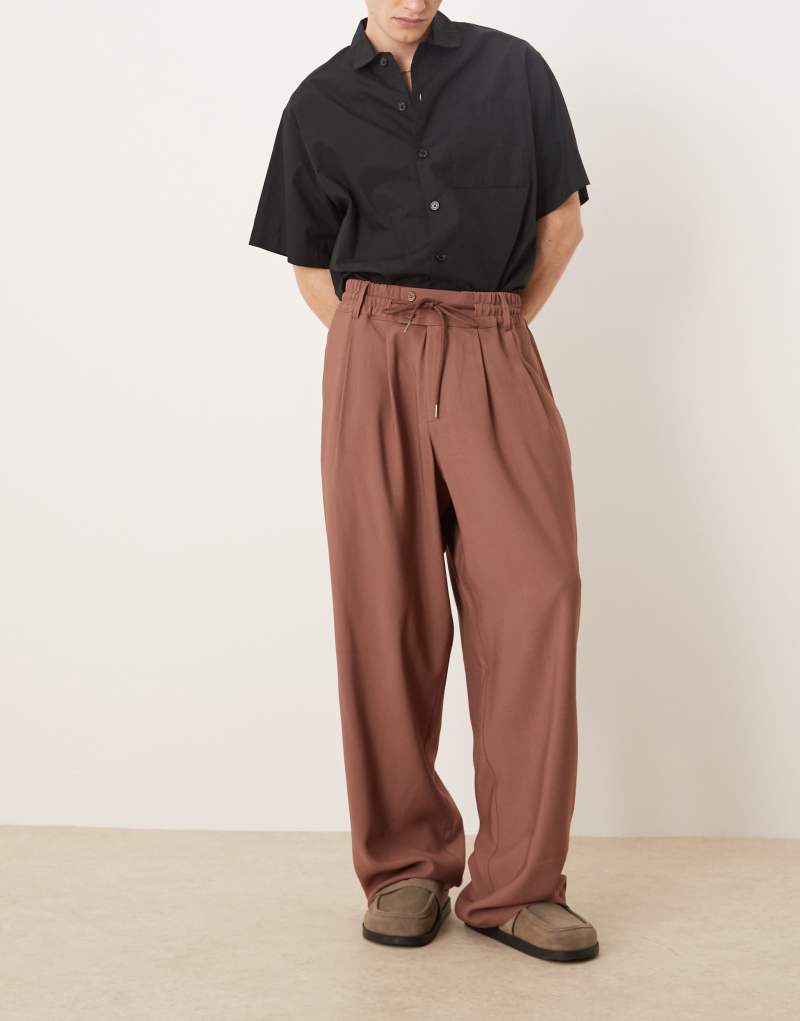 ASOS DESIGN loose fit smart pants with wide waistband and elasticated waist in brown Asos Design